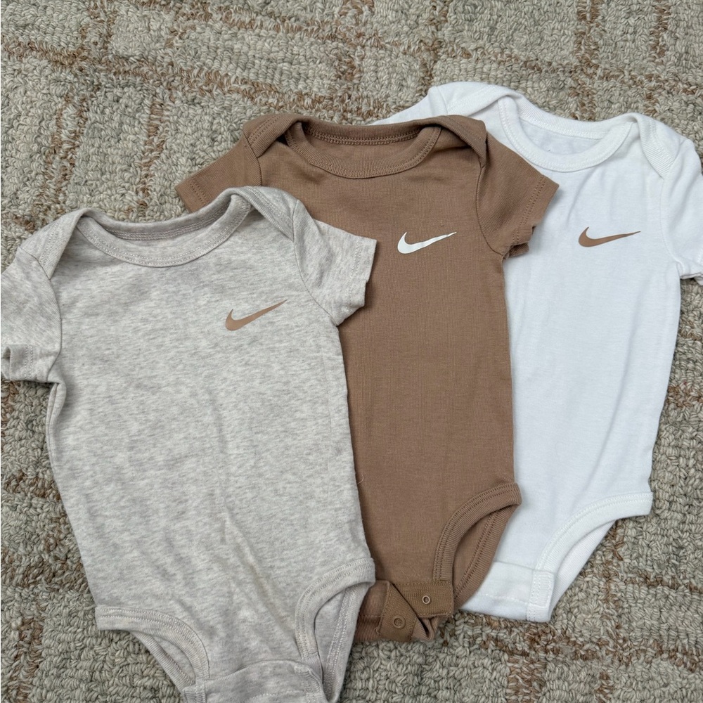 3 Nike Onesies